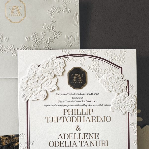 Wedding Invitation Design with Floral Embossing