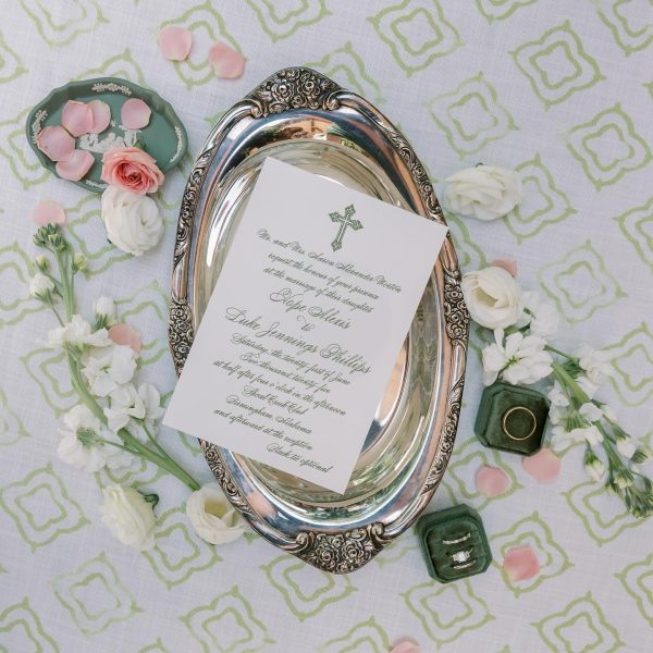 Elegant Wedding Invitation with Flowers and Rings