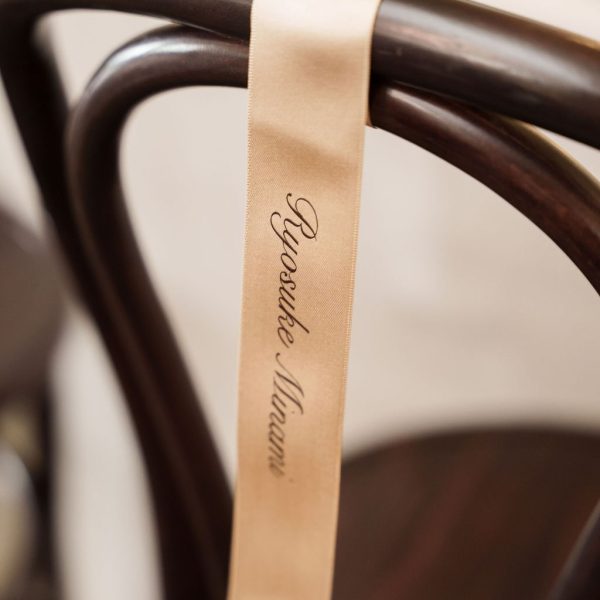 Elegant Wedding Chair Decor with Personalized Ribbon