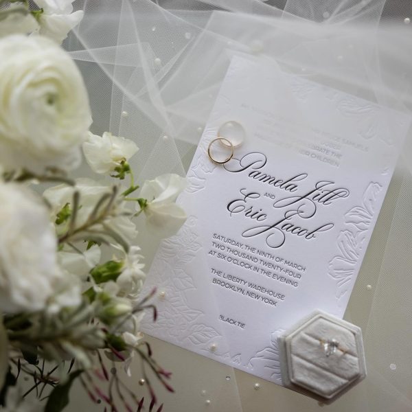 Wedding Invitation with Rings and Flowers